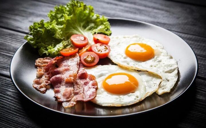 Two eggs with bacon eggs
